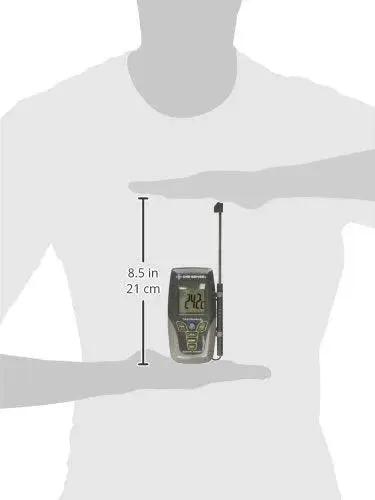 Pocket Kangaroo Thermometer With Cable Storage And Min Max Memory shown in hand with probe extended, 8.5 inches tall.