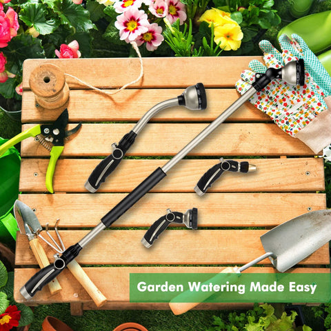 RESTMO 36-inch metal watering wand with 180° swivel head and 10 spray patterns on a wooden bench.