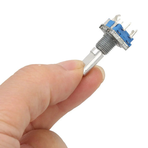 Hand holding 10 Pack Rotary Encoder With 360 Degree Spin Code Switch And Push Button 5 Pin Digital Potentiometer for DIY electronics and controllers