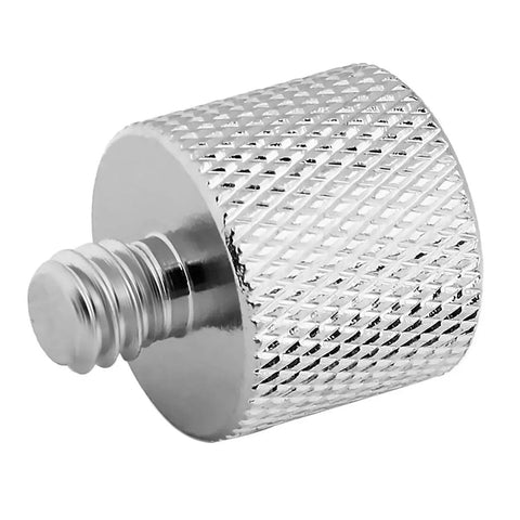 Close-up of 3/8 Inch Female To 1/4 Inch Male Thread Adapter for Camera Monitors, nickel plated brass construction, knurled design.