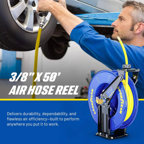 Mechanic using a Retractable Air Hose Reel Three-Eighths Inch By 50-Foot Heavy Duty Premium SBR Hose Up To 300 Psi Reinforced Steel Construction Spring Driven Industrial Dual Arm And Pedestal The Workhorse For Your Workshop Or Garage in a garage setting