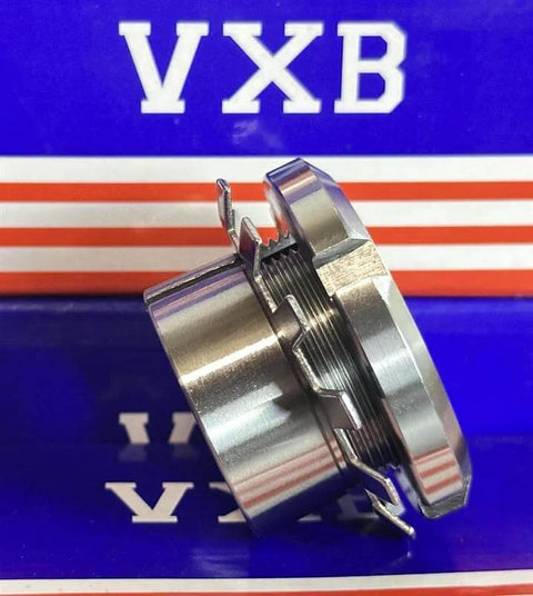 H209 40mm adapter sleeve with lock nut and washer, silver metal, heavy machinery part