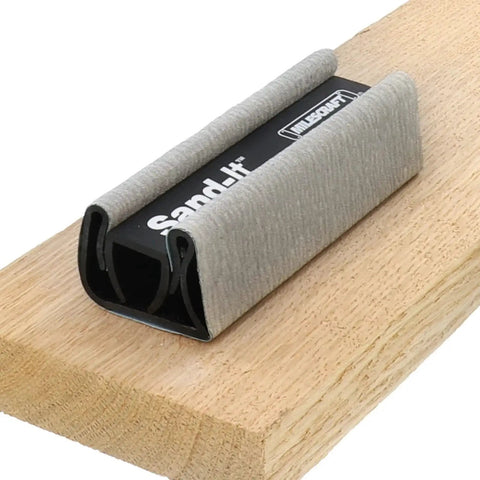 4 In 1 Sanding Block For Flat Convex Concave And Round Surfaces resting on a wooden plank