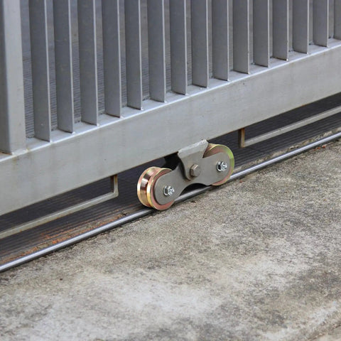 Two Pack Four Inch Solid Slide V Groove Wheels With Heavy Duty Sliding Gate Casters For Industrial Rails And Machinery One And Three Quarter Inch Width Gate Wheels With Screws And Double Bearings Corrosion Resistant Load Capacity Up To 1000 Lbs installed on gate rail