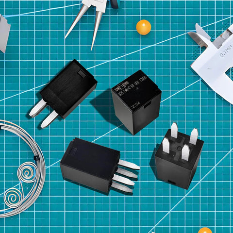 Beefy 12V DC SPNO Relay 20A High Temperature Up To 125C For Automotive And Off Road Fans Four Pack shown on grid background