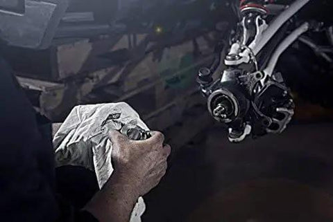 Close-up of mechanic using 40mm Wheel Bearing Greaser Kit For Polaris ATVs UTVs And SxS Must Have Quick Grease Packer For Bearings