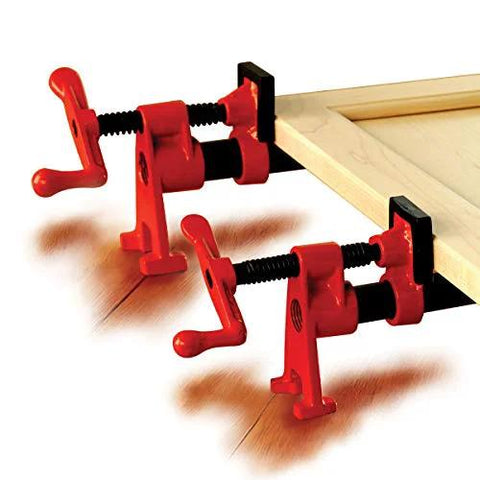 Bessey BPC-H34 pipe clamps, red H-style clamps with black screws, two clamps securing a wood board.