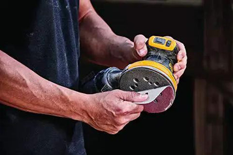 Hands holding 20V Max Brushless Orbital Sander Tool Only With Variable Speed Control 8000 To 12000 OPM Low Profile Body Close Work