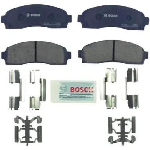 Bosch BC833 QuietCast ceramic front brake pad set with hardware; two blue pads and mounting clips