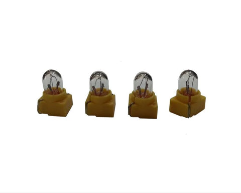 Four yellow GM instrument cluster bulb assemblies with clear glass bulbs