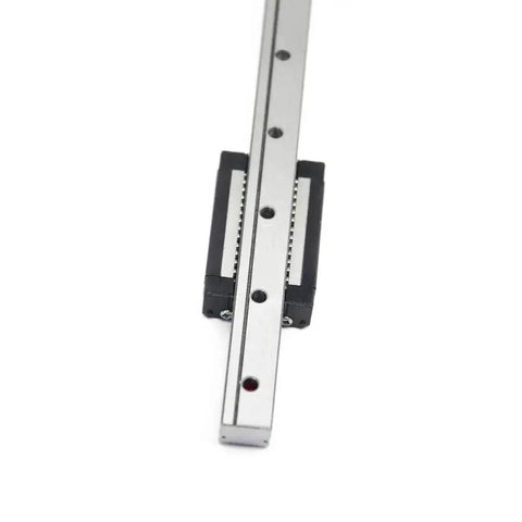 Close-up of MGN12 400mm Linear Rail Guide with Two MGN12H Black Stainless Carriage Blocks for 3D printers and CNC projects.