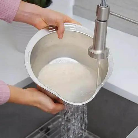 Stainless Steel Rice Washer Strainer Bowl With Agitator Bumps For Quick No Fuss Rinsing, shown in use under faucet, rust resistant colander