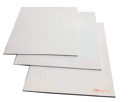 CeraTex 3170 ceramic fiber paper sheets, white insulation gasket material, 1/8 in thick, stacked with orange logo
