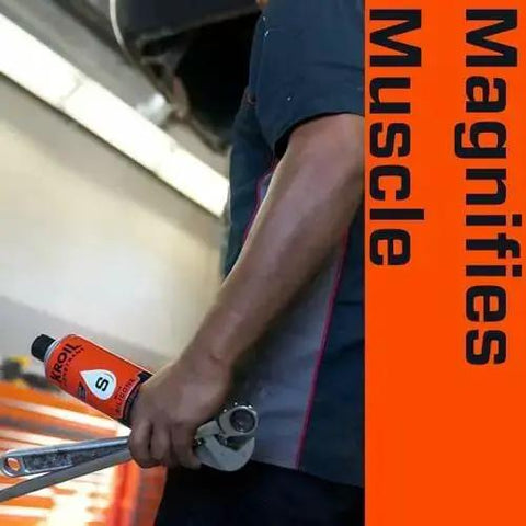 Person holding Silicone Enhanced Rust Penetrant For Frozen Metal Parts, Penetrating Lubricant Aerosol, 16.5 oz, industrial setting