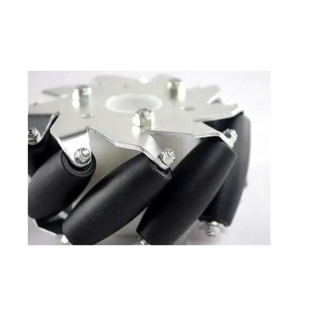 Close-up of 4 Inch 100mm Right Mecanum Wheel for RC Cars showing omnidirectional rollers and metal frame, Model 14161, assembled.