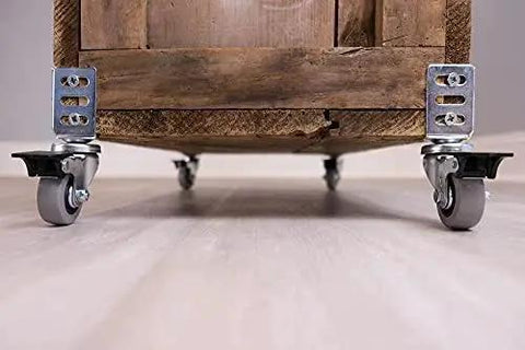 Furniture piece with corner casters on hardwood floor showcasing 1.5 Inch Round Non-Marking Rubber Slip-On Chair Leg Tips.