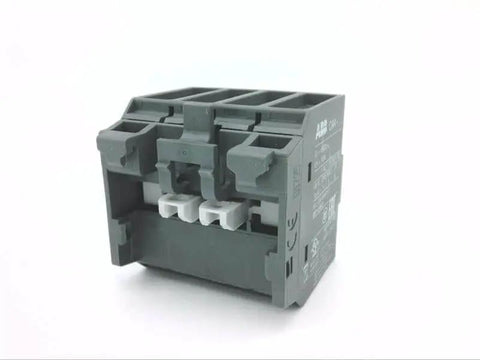 Single front mounted auxiliary contact block with 4 NO contacts for control circuits and switchgear, side view of panel mount unit.