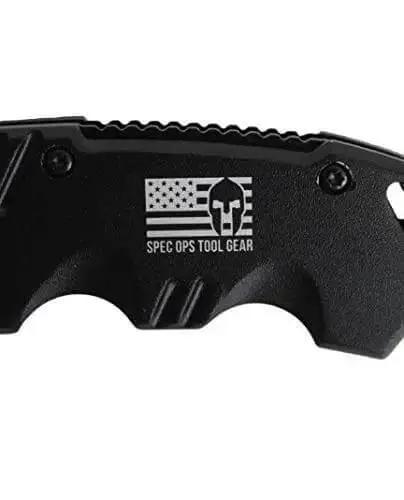 Close-up of beefy grip on spring assisted folding knife with 3.5 inch steel blade, fast deploy one hand open, built for work.