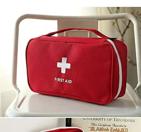 Red Go-To First Aid Bag For Home And Outdoor Adventures on chair, lightweight with full zip, durable polyester for camping, hiking, travel.