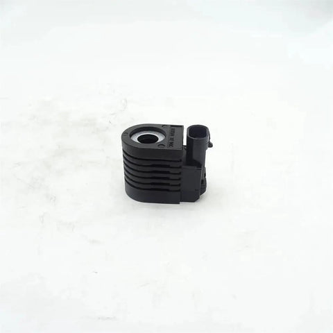 KV23085 solenoid valve coil, black plastic housing with electrical connector, front view