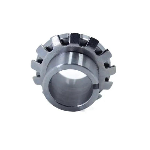 Close-up metal bearing adapter sleeve with external gear teeth, gray finish, hollow bore for industrial bearings.