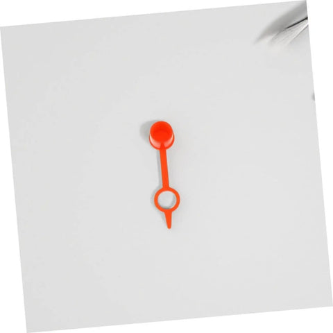 Single red plastic dust cap from 200Pcs Butter Mouth Cap Grease Extension Fitting Caps And Nozzles Kit for air tools and machinery.