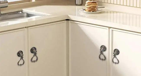 Installed Set Of 4 Tear Drop Knob Pull Handles In Antique Bronze Finish on kitchen cabinets, zinc alloy, 1.3 x 2.4 inches with included screws