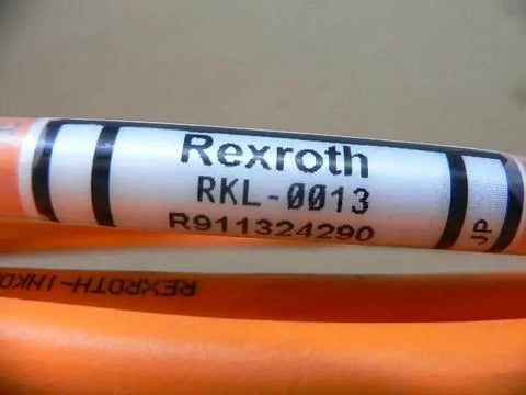 Close-up view of servo motor cable RKL-0013 R911324290 for Bosch Rexroth drives - shielded encoder/control cable, used unit