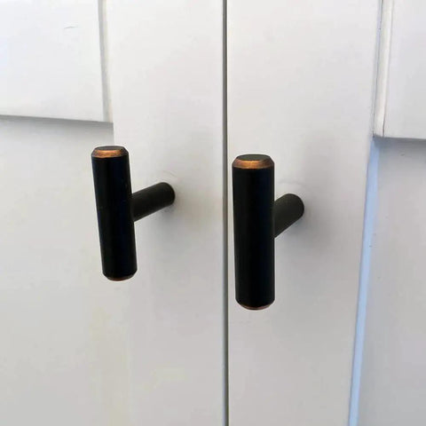 Solid Stainless Steel Euro Style Bar Cabinet Pulls 25 Pack One And Three Quarter Inch Length Oil Rubbed Bronze Finish on white cabinet