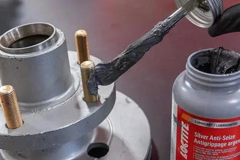 Application of Heavy Duty Automotive Silver Anti Seize Lubricant With Graphite And Metallic Flake Fortification, 8 Oz Brusttop Bottle