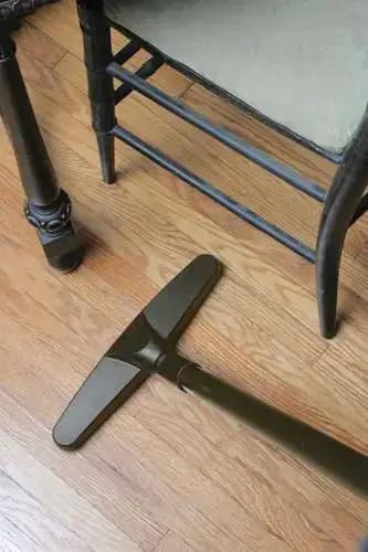 Upright and Canister Vacuum Extension Hose and Attachment Kit cleaning wood floor under chair