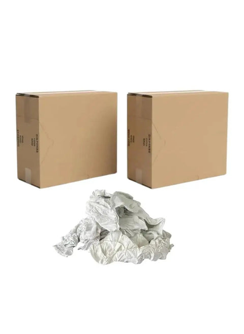 Boxes and pile of recycled multicolored T-shirt cloth rags for everyday cleaning, paint spills, stains, polishing, dusting, 50 lb pack.