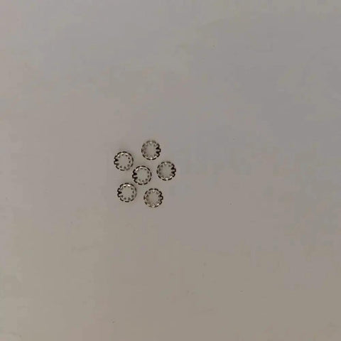 6 small round metal gears on a plain background, part of 4 In 1 Out Tube For AD5X 3D Printer And IFS 4 Color Module Filament Feeding PTFE Tubing