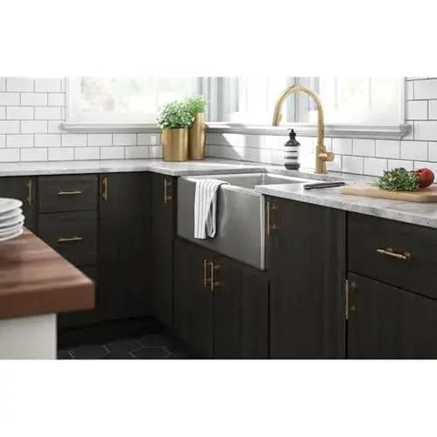 Modern kitchen with Champagne Bronze Cabinet Hardware Set 5 Pack Adjustable Drawer Pulls on dark cabinets near farmhouse sink.
