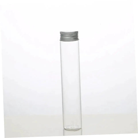 Clear glass vial with aluminum cap, part of a 10-pack. Ideal for travel storage of candies, nuts, beads, and mini art supplies.