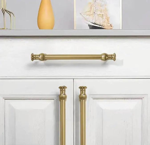 Installed brushed brass cabinet handle from Set Of Ten 4 Inch Center Hole Brushed Brass Cabinet Pulls Solid Heavy Duty Cabinet Hardware.