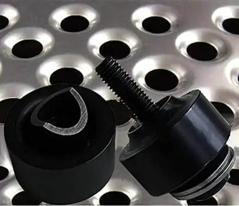 1 Inch Hole Punch And Flare Tool With Dimple Plate Dies In Black Steel for DIY metal fab, shown with pierced metal sheet backdrop
