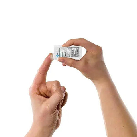 Person applying Travel Size Triple Antibiotic Ointment Pack For Minor Scratches And Burns 0.9g Singles 144 Pack First Aid Kit Essentials