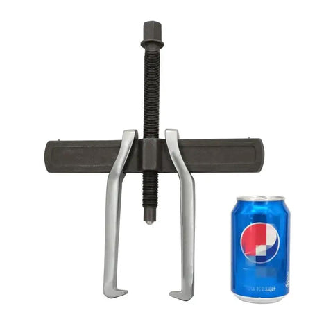 10 Inch Two Jaw Gear Puller for Removal Of Pulleys, Flywheels And Bearings next to a soda can for size comparison