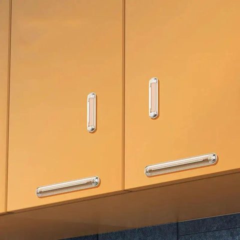 Cabinet with Clear Silicone Furniture Bumpers Set 8 Pcs Self Adhesive Protectors For Doors installed on corners and edges.
