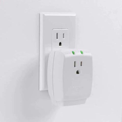Compact Single Outlet Surge Protector Wall Tap With Grounded Outlet And Protected Light Indicators, installed on wall.