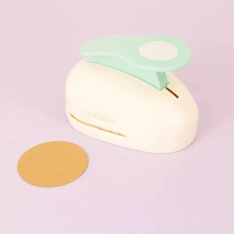 Three Inch Circle Hole Punch With Lever For Precise Clean Cuts Great For Scrapbooking Cards Journals And DIY Paper Crafts Super Handy Compact Round Punch for Cardstock On The Go shown with punched circle