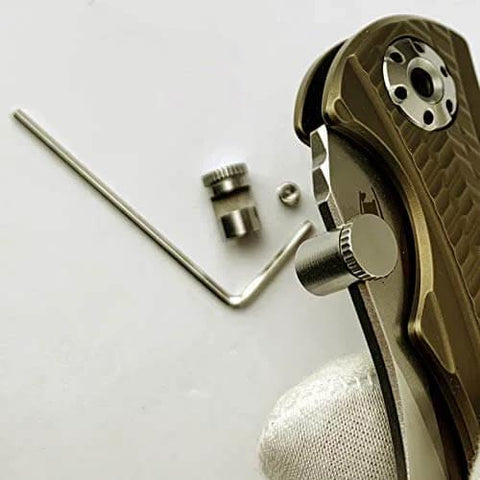 3 Pack Thumb Stud Replacement For Buck 110 Knife With Hex Wrench In Black Silver Brass Colors next to knife handle