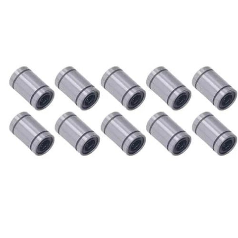 Ten Piece Set Of Alloy Steel Linear Motion Bearings And Bushings For Low Friction High Precision Smooth Operation In CNC Machines And 3D Printers Workhorse Quality For Industrial Use, arranged on a white background.