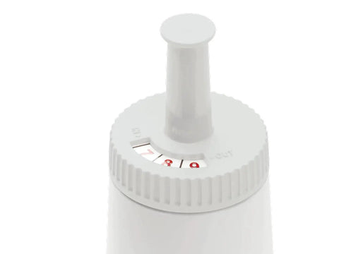 Breville espresso machine water filter close-up view with white housing, vertical post and numbered indicator dial
