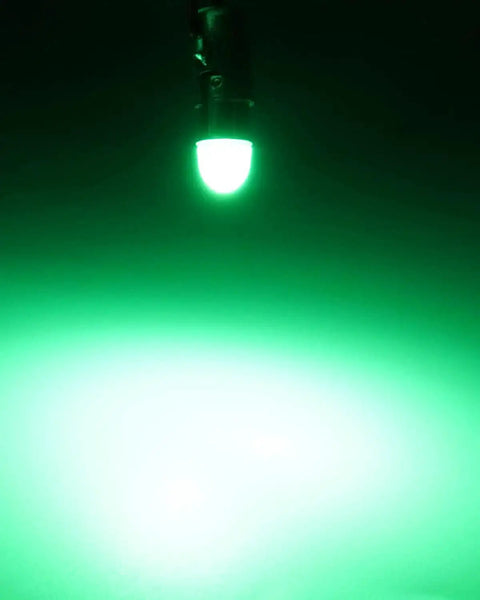 Green Ba9s Led Bulb 12V Bi Polar DC AC Compatible For Indicator Lights Dome Map Trunk illuminated in dark, showing vibrant light