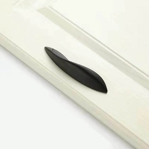 4Pcs Arcuate Cabinet Pulls 3.8 Inch Center To Center S Shaped Matte Black Zinc Alloy installed on cabinet door