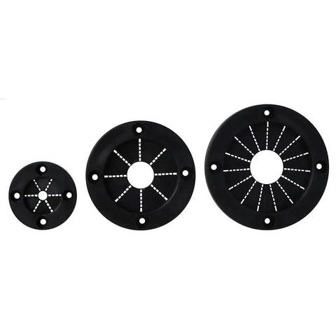 Three sizes of black rigging grommets with flexible rubber centers and sturdy plastic rings for marine rigging applications.