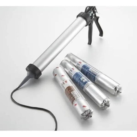 Hybrid Sealant Black Cartridge 1/10 Gallon (Pack of 1) next to caulking gun and other sealant cartridges