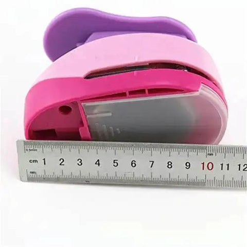 Side view of 2 Inch Oval Paper Punch For Crafting And Scrapbooking, Easy To Use Craft Punch Tool For Card Making with ruler measurement